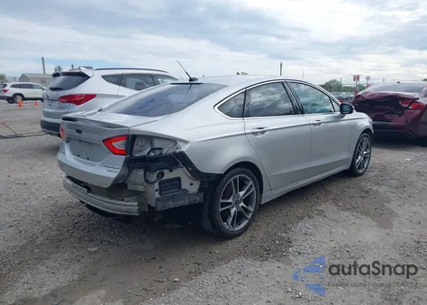 2015 Ford Fusion Titanium z USA, uszkodzony, nr VIN 3FA6P0K90FR277148
